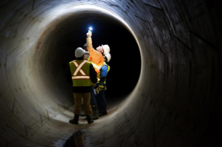 Workers in tunnel
